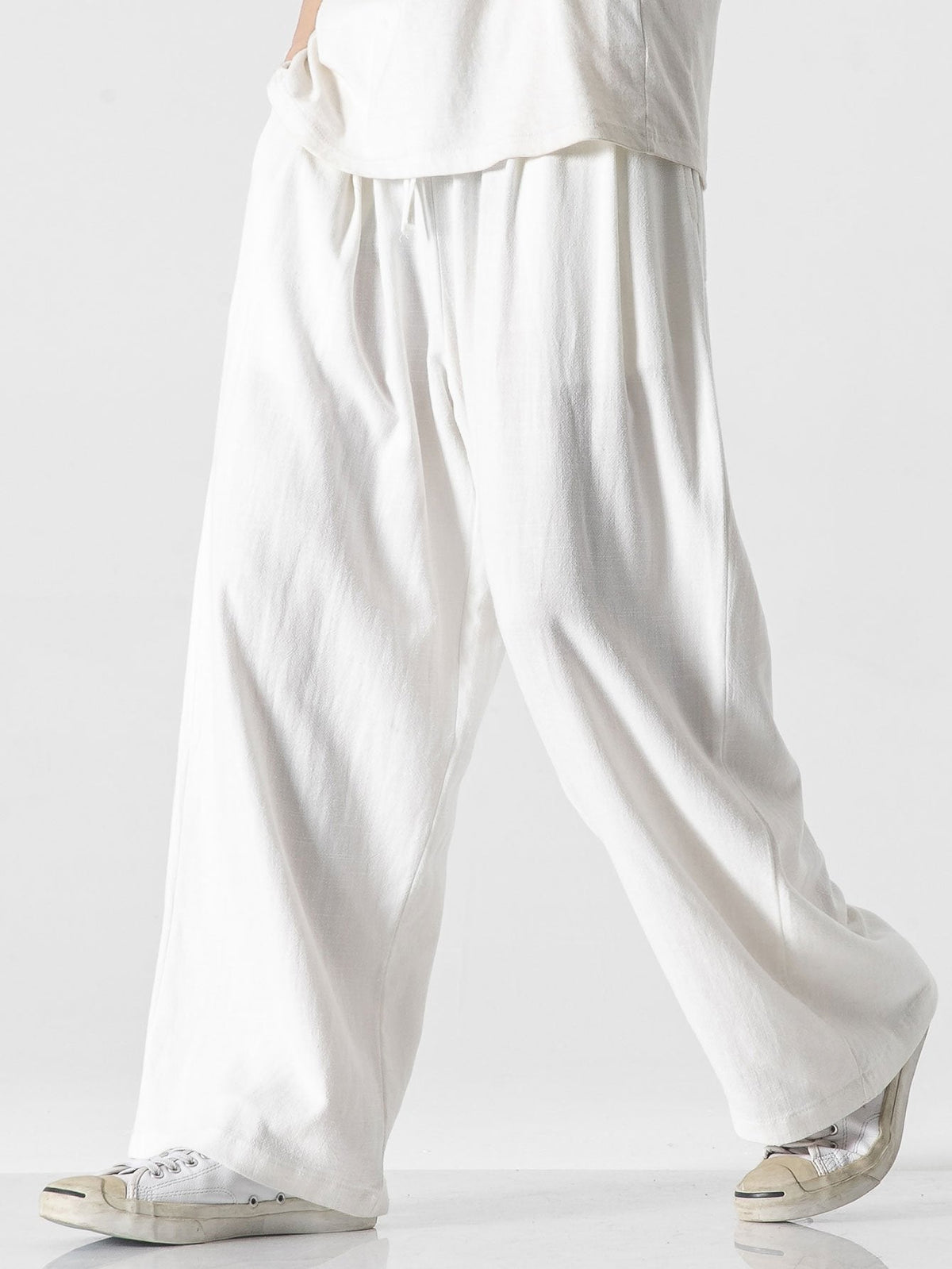 Pantalon homme coupe ample - image 8